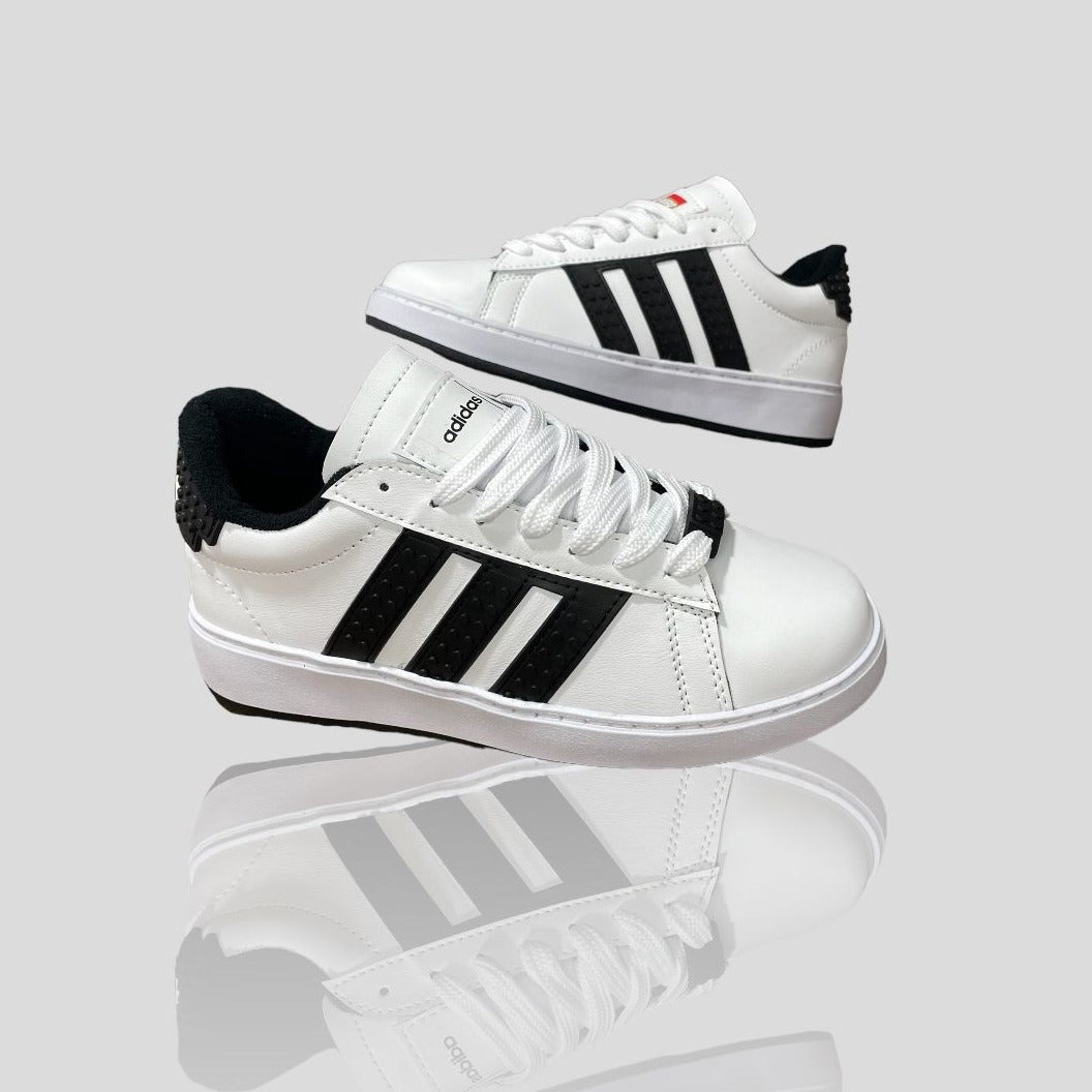 Tenis adidas blancos con negro sale